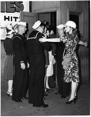 Showgirl Betty Douglas Doubling as Air Raid Warden during WWII, New York City, USA, 1943