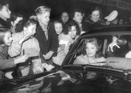 Romy Schneider with young fans, 1957 (b/w photo)