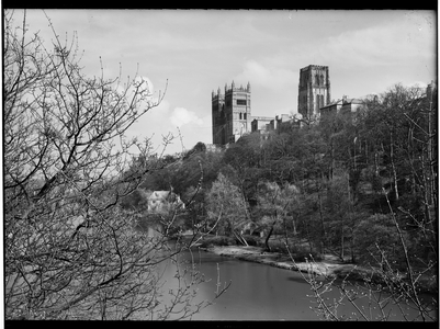 View of the cathedral church on the hilltop from the south-west, with the river Wear in the foreground, 1948 (b/w photo)