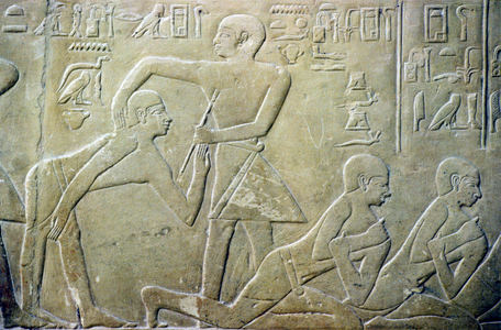 Ancient Egypt, Relief, Village elders forcd to admit their faulty tax returns to clerks, Tomb of Merereuka, 6th Dyn (photo)