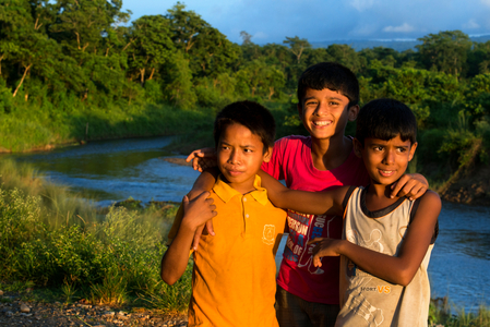 Friend boys in Rapti River, Chitwan National Park, Nepal, Asia (photo)