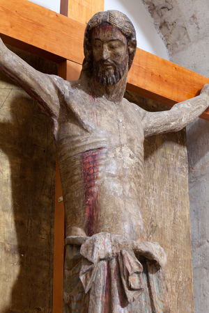 Collegiate church. Interior. Sculpture. Christ on the cross. Romanesque/gothic. Polychrome wood. Detail. Bust. 14th century.