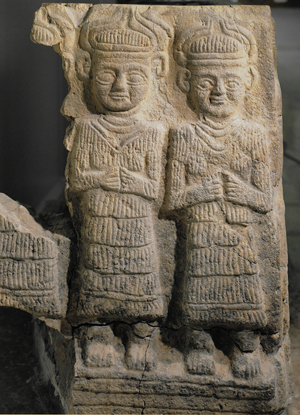 Two local deities with horned crown and stern face