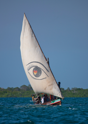 Eye painted sail on a sailing dhow, Lamu, Kenya, Africa (photo)