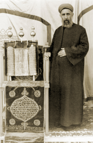 Sephardi rabbi standing next