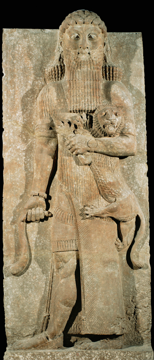 Statue of a hero taming a lion. Palace …