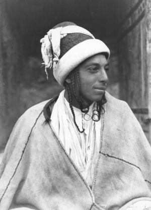 Inhabitant of a Yazidi village in the Sindar mountains in traditional dress, Iraq, 1920s (b/w photo)