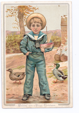A Victorian Christmas card of a boy dressed as a sailor holding a toyboat, c.1880 (colour litho)