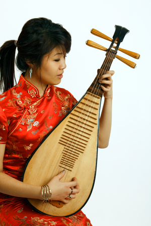 Chinese girl playing a Chinese Pipa