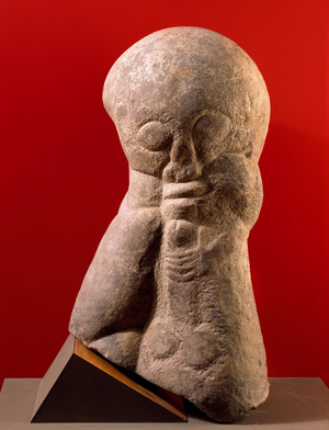 Nordic deity Freyr holding a sex, 4th century (stone)