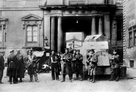Revolutionaries with armored cars in the yard of the Berlin Palace, 1918 (b/w photo)