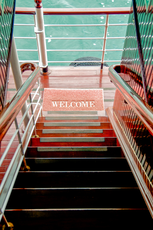 Vietnamese transport: Welcome mat at foot of stairs on luxury cruise ship in the Red River Delta, Vietnam