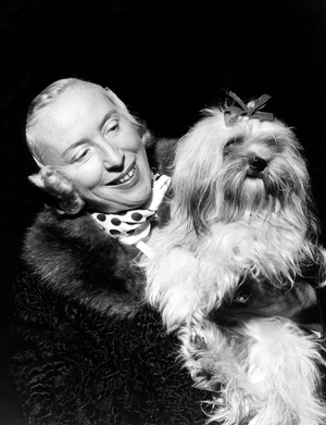 French Singer Suzy Solidor With Griffon Min 1955 (b/w photo)