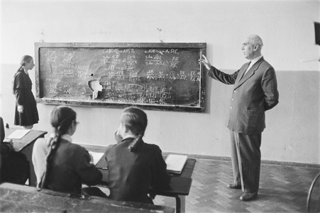 Teacher and students in a classroom in Moscow, Soviet Union, in ..., 1958 (photo)