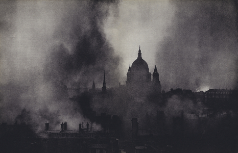 St Paul's Cathedral, London, surrounded by fires and smoke during the Blitz, World War II, 1940-1941 (b/w photo)