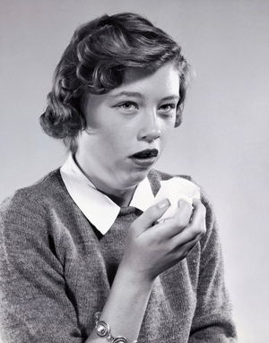 Young woman coughing