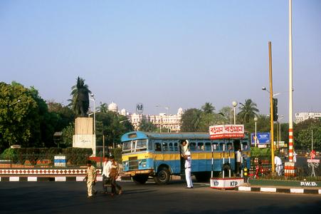 India: Traffic near the Subhas Chandra Bose (1897 - 1945) statue, central Kolkata (Calcutta), West Bengal
