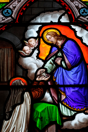 Saint Therese of the Child Jesus or Therese of Avilla, (stained glass window)