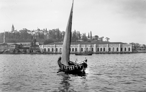Vintage coastal scene on the Caspian sea with sailboat, 1908 (photo)