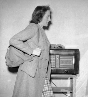 Oslo 19450525 Milorg lady at the radio with sack on the back. Milorg. The picture …, 1945 (photo)