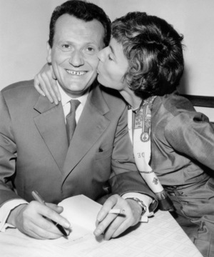 French Writer Paul Guimard Receiving Prize For his Book "Rue Du Havre", here Congratulated By his Wife December 09, 1957 (b/w photo)