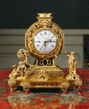 Gilded clock by Franz Steinbach in Raab, Hungary (photo)