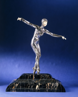 Rare figure of an exotic dancer,  (large silvered bronze and ivory on black marble base)