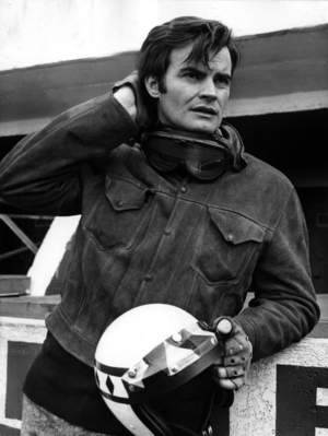 French Comedian Jean-Claude Drouot Training on Le Mans Circuit For his Next Film "5,000 Kilometers To Glory", February 6, 1969 (b/w photo)