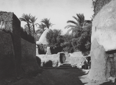 Egypt: Charga Oasis, Small square in the chief village (b/w photo)
