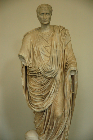 Man wearing a toga. Roman statue. 1st century AD.