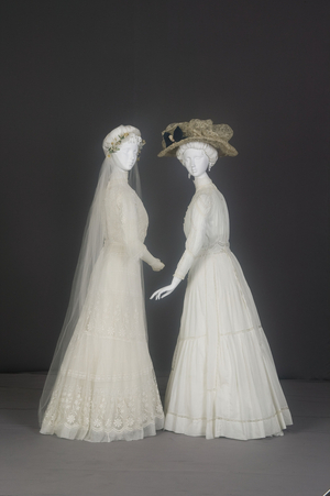 Wedding dresses, 1911 (cotton batiste, lace; Marshall Field & Co., Chicago) and 1910 (embroidered net, lace)