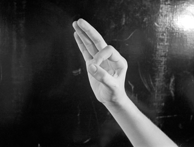 Letter F in finger alphabet (b/w photo)