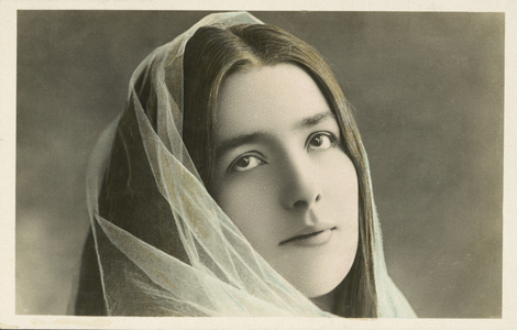 Portrait of a woman wearing a veil (coloured photo)