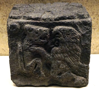 Stone block with confronting eagle and jaguar and glyph