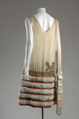 Evening gown, c.1926 (back oblique view), Nicole Groult, France Silk satin and crepe, metallic thread, and fur