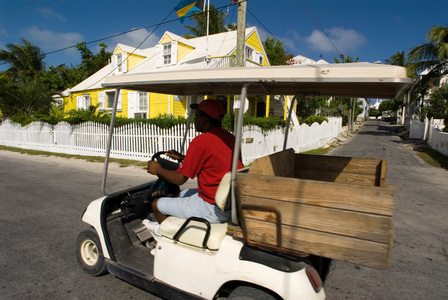 Golf car and loyalist home, Bahamas (photo)