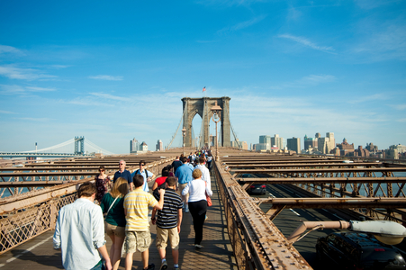People Crossing Brooklyn Bridge Towards Brooklyn, New York, USA (photo)