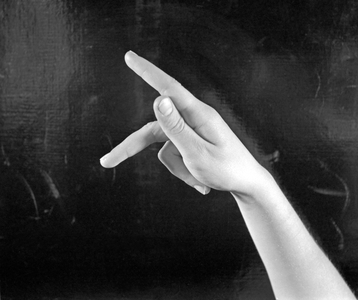Letter P in finger alphabet (b/w photo)