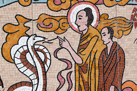 Ong Nui buddhist pagoda, Wall fresco, The life of the Buddha, Shakyamuni Buddha with the snake, Quy Nhon, Vietnam, 2019 (photo)