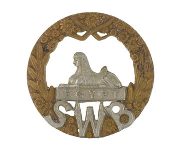 Cap badge, c.1896-1964 (metal)