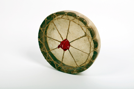 Red Indian Leather or natural skinned hand drum.