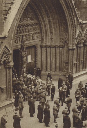The coffin ot the Unknown Warrior being carried into Westminster Abbey for burial, Armistice Day, 1920 (b/w photo)