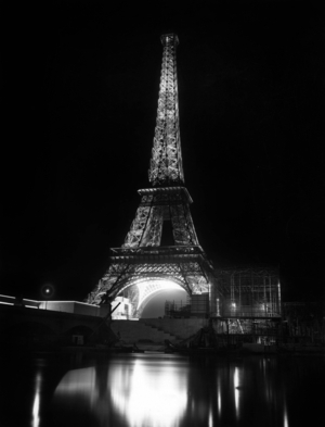 The Eiffel Tower by night at time of set-up of wrold fair in Paris, 1937