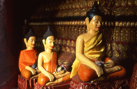 Cambodia: Buddha images in the main "vihara" (temple sanctuary), Wat Phnom, Phnom Penh (photo)