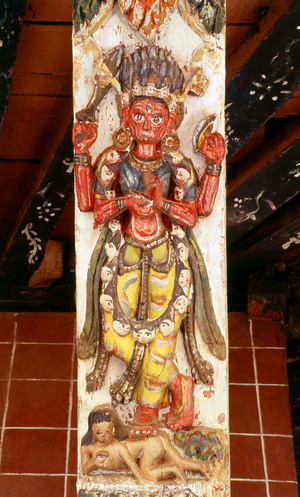 Nepal: A depiction of Shiva on a carved temple roof strut at the Buddhist Rudra Varna Mahavihar (Uku Bahal) temple, Patan, Kathmandu