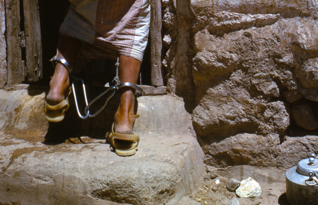 Yemenite man who is convict from crime wears leg irons as shackles when on the street…, 1964 (photo)