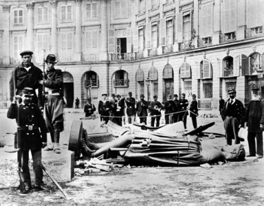 The communards are posing in front of the ruin of the statue of Napoleon Ist dressed as Cesar, after have be knock over the Great Army Column on the Vendome Square (formelly called Conquests Square, then LouistheGreat Square, then Pikes Square under the FrenchRevolution), on may 16th, 1871, in Paris.