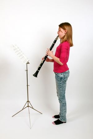 Young girl playing the B flat clarinet