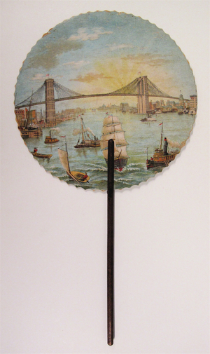 "Commemorative fan printed with scene of Brooklyn Bridge" (cardboard leaf)