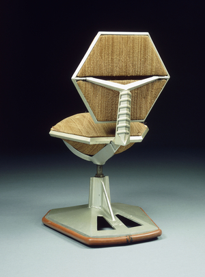 An articulated and hexagonal chair, c.1956 (aluminium, paint, fabric and rubbber)